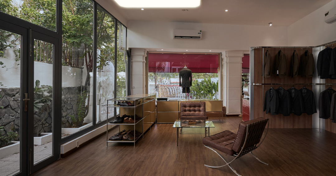 Marcher Saigon interior — classic menswear and shoe display